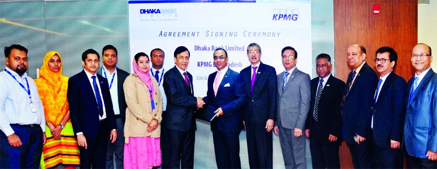 Syed Mahbubur Rahman, CEO of Dhaka Bank Limited and Ali Ashfaq, Partner of KPMG Bangladesh (Rahman Rahman Huq), exchanging an agreement signing document for Core Banking System Review at the Bank's head office in the city recently. Under the deal, Rahman