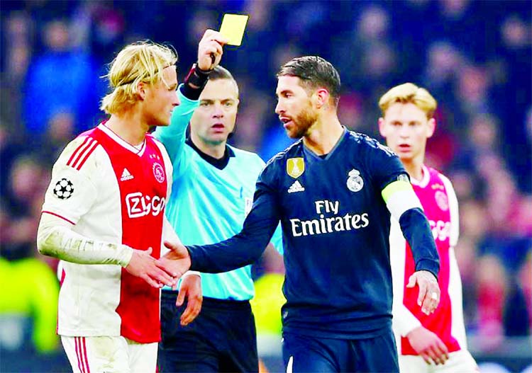 UEFA has launched a disciplinary investigation that could rule Real Madrid captain Sergio Ramos out of a potential Champions League quarter-final, first leg after he admitted getting booked on purpose in Wednesday's 2-1 win at Ajax Amsterdam.