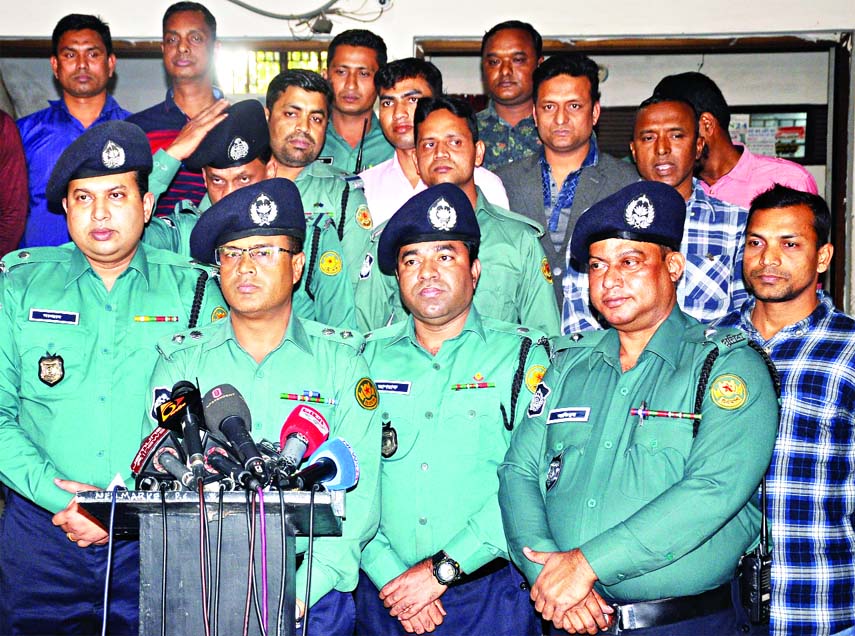 Deputy Police Commissioner of Ramna Zone Maruf Hossain speaking at a prÃ¨ss briefing about arrest of two persons involved in killing former Principal of Eden Mahila College Mahfuja Chowdhury Parvin at New Market Thana on Friday.