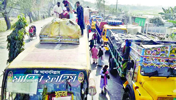 Thousands of vehicles got stuck in a traffic gridlock as Bishwa Ijtema devotees heading towards the first day of Ijtema congregation. This photo was taken from Daulatdia Ferry Ghat area on Friday.