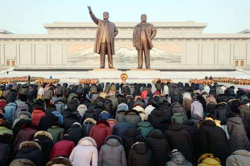 People paying their respects to the late North Korean leaders Kim Il Sung and Kim Jong Il on Mansu hill in Pyongyang on Saturday.