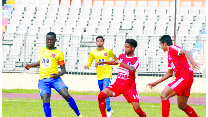 A moment of the football match of the Bangladesh Premier League between Sheikh Jamal Dhanmondi Club Limited and Sheikh Russel Krira Chakra Limited at the Bangabandhu National Stadium on Sunday. The match ended in a goalless draw.