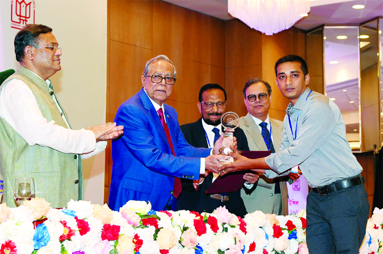 President Abdul Hamid handing over Bangladesh Press Council Medal-2019 to Photo Journalist of The New Age Sony Ramany at Rupashi Bangla Grand Ball Room of Hotel InterContinental in the city on Monday.