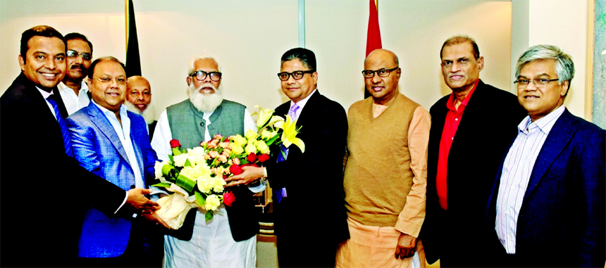 A team led by Mohammad Ali Khokon, President of Bangladesh Textile Mills Association (BTMA), meet with the Prime Minister's Private Sector and Investment Affairs Advisor Salman F Rahman with bouquets at his office in the city on Sunday. Senior leaders o