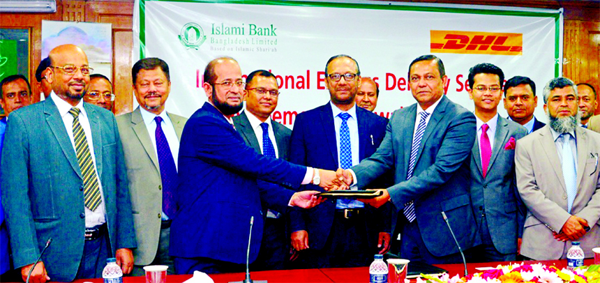 Mohammad Ali, DMD of Islami Bank Bangladesh Limited and Md. Miarul Haque, Country Manager of DHL Worldwide Express (BD) Pvt. Limited, exchanging an agreement signing document at the Bank's head office in the city on Monday. Md. Mahbub ul Alam, CEO, Abu R