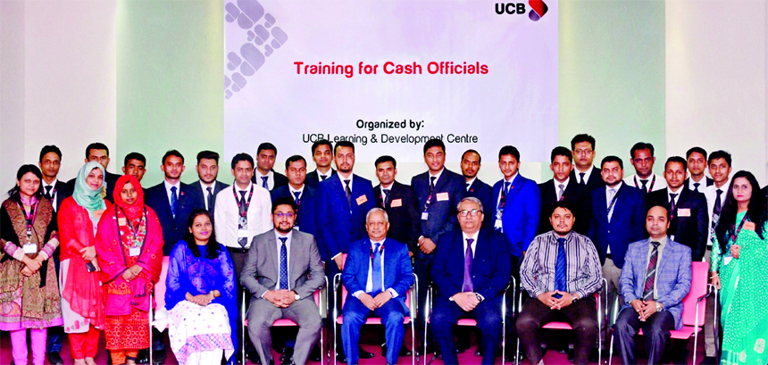 Arif Quadri, AMD of United Commercial Bank (UCB) Limited, poses for a photograph with the participants of a week-long training for its Cash Officers at the Bank's head office in the city recently. Abul Ali Ahad, Head of Learning & Development and senior