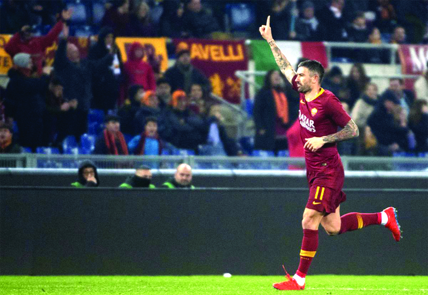 Roma's Aleksandar Kolarov jubilates after scoring against Bologna during the Italian Serie A soccer match between AS Roma and Bologna FC at Olimpico stadium in Rome, Italy on Monday.