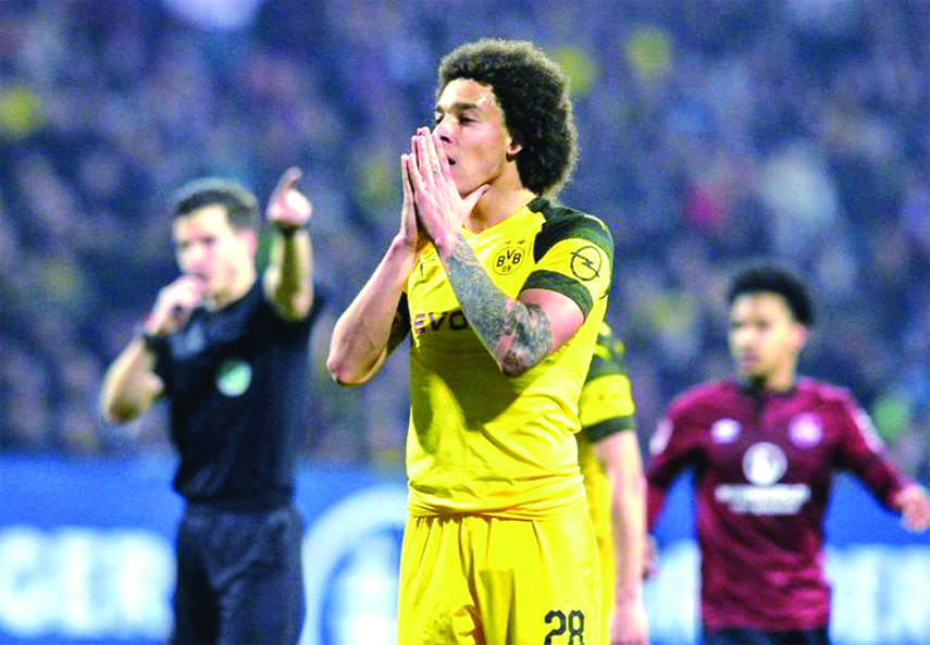 Borussia Dortmund's Belgian midfielder Axel Witsel sums up a frustrating night for the Bundesliga leaders who, were held to a goalless draw at bottom side Nuremberg on Monday.