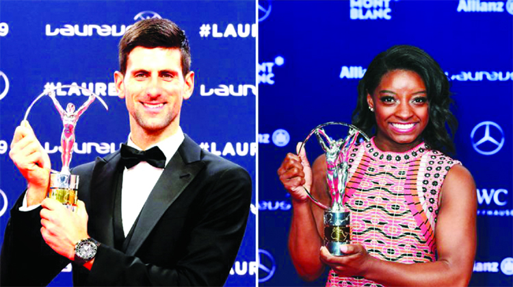 Laureus World Sportsman of The Year 2019 winners Serbia's tennis player Novak Djokovic(left) and gymnast Simone Biles of the US pose with their awards on Monday.