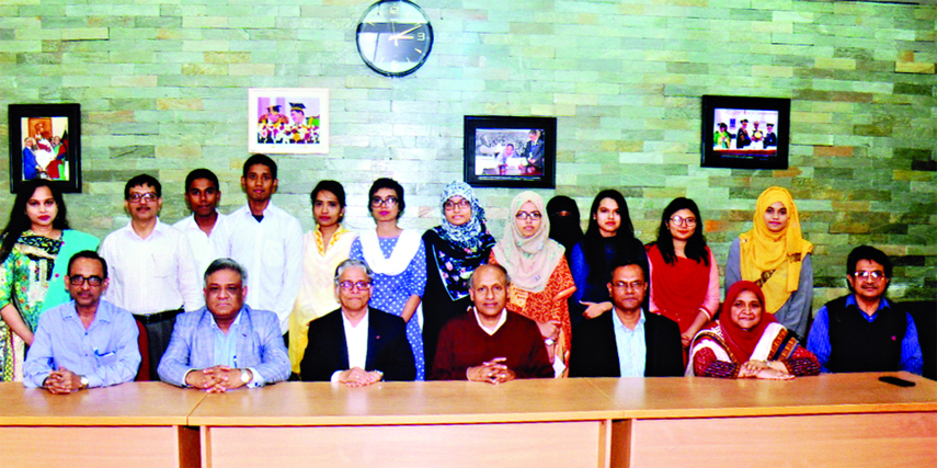 Dhaka University Vice-Chancellor Prof. Dr. Md. Akhtaruzzaman poses for photograph with the recipients of "Nagao Natural Environment Foundation (NEF) of Japan scholarship"" and other distinguished persons at a function held on Monday at the VC's lounge o"