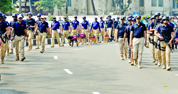 Law enforcers conducting vigorous search around the Central Shaheed Minar on Tuesday ahead of International Mother Language Day on Thursday.