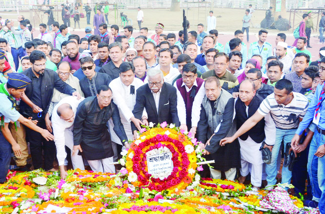 GAZIPUR: National University VC Prof Dr Harun-or-Rashid along with teachers placing wreaths at the Central Shaheed Minar on the occasion of the Amar Ekushey and the International Mother Language Day on Thursday.