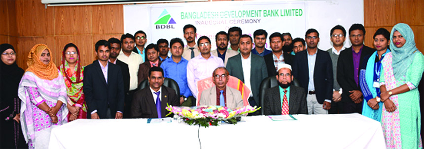 Manjur Ahmed, Managing Director of Bangladesh Development Bank Limited (BDBL), poses for a photograph with the participants of a 2-day long training course on "IT Security & Fraud Prevention in Banks" at its Training Institute in the city on Tuesday. Mo