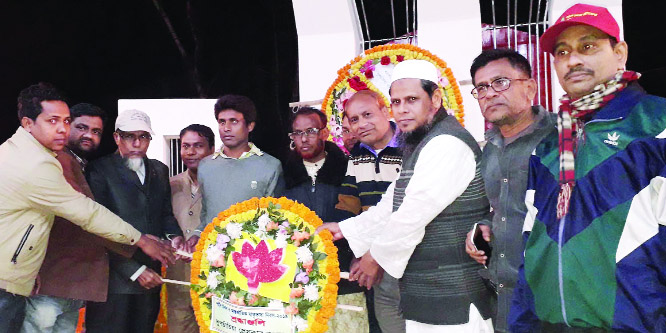 DUPCHANCHIA (Bogura): Golum Faruk, President, Dupchanchia Press Club with other leaders placing wreaths at the Central Shaheed Minar marking the Amar Ekushey on Thursday .