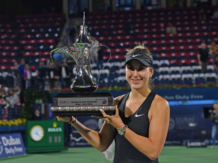 Belinda Bencic posing for picture with trophy after winning the Dubai Duty Free Tennis Championships at Dubai Tennis Stadium on Saturday.