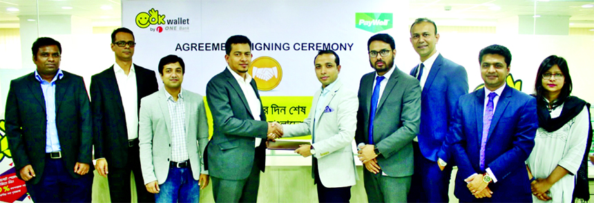 Gazi Yar Mohammed, Head of Digital & Inclusive Financial Services of ONE Bank Limited and Anisul Islam, CEO of Cloud Well Limited, exchanging an agreement signing document at the Bank's corporate office in the city recently. Under the deal, Cloud Well wi