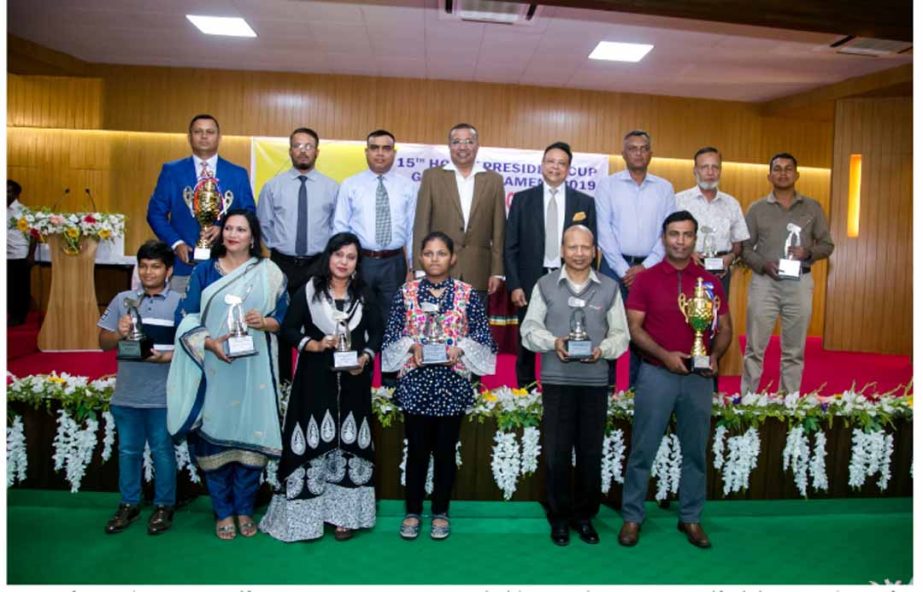 The winners of the 15th Hosaf President Cup Golf Tournament with Major General Md Akbar Hossain, President of Savar Golf Club and General Officer Commanding of Ninth Infantry Division of Bangladesh Army and Moazzam Hossain, Chairman of Savar Golf Club pos