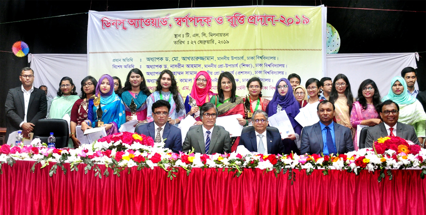Dhaka University Vice-Chancellor Prof Dr Md. Akhtaruzzaman distributing awards and scholarships among the brilliant students who got Dean Awards at a function held on Wednesday at TSC auditorium of the University.