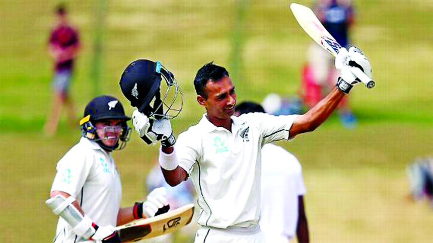 Jeet Raval of New Zealand, celebrating his maiden Test hundred during the second day of the first Test match between Bangladesh and New Zealand at Hamilton in New Zealand on Friday.