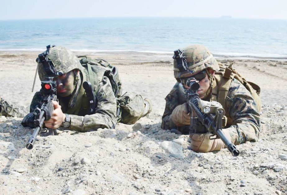 US and South Korean marines take part in a joint landing operation, part of the Annual Foal Eagle exercises, near the southeastern port of Pohang.