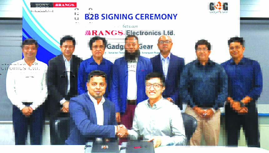 Managing Director of Rangs Electronics Limited (known as "SONY-RANGS) J Ekram Hussain and CEO of Gadget & Gear (G&G) Nure Alam Shimu, exchanging an agreement signing document at Sonartori Tower in the city recently. Under the deal, G&G will be able to di