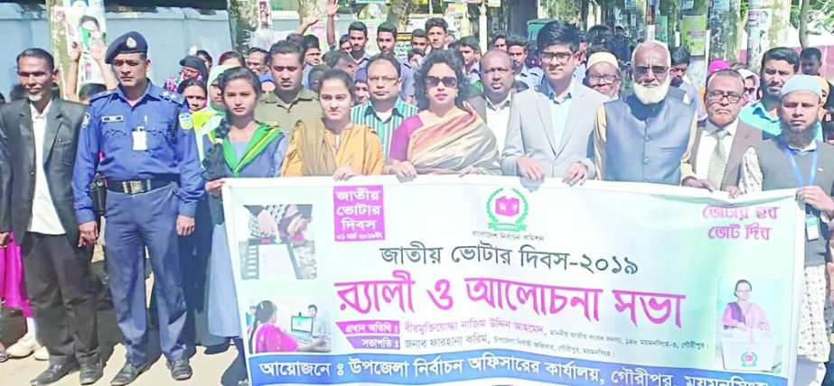 GOURIPUR (Mymensingh ): A colourful rally was brought out at Gouripur town on the occasion of National Voters' Day on Friday .