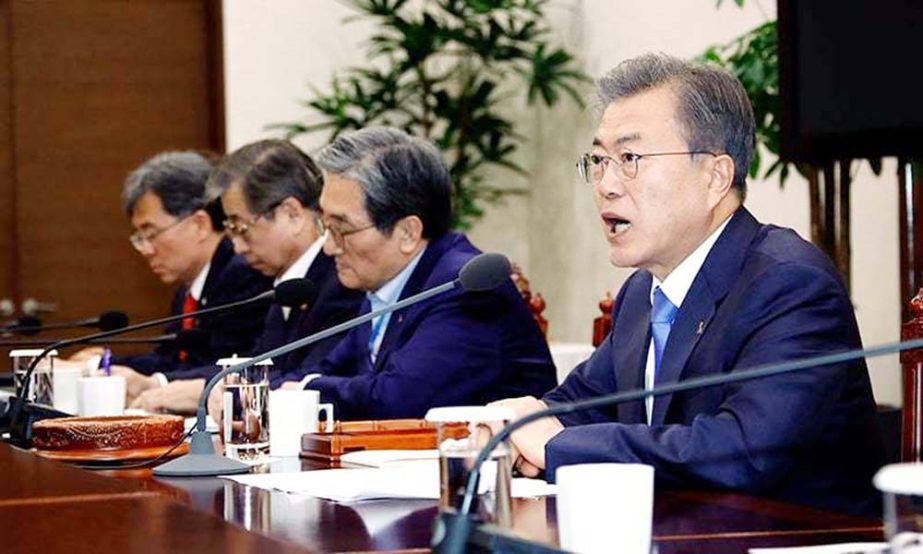 South Korean President Moon Jae-In presides over a meeting of the National Security Council at the Presidential Blue House in Seoul.