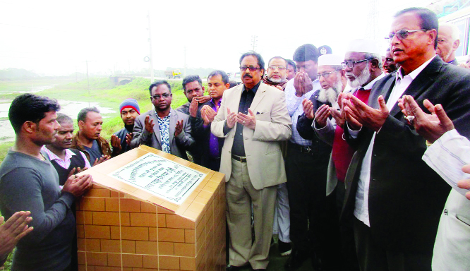 SYLHET: Mahmud- us- Samad MP offering Munajat after inaugurating dredging work of Barobagha River at Moghala Bazar as Chief Guest recently.