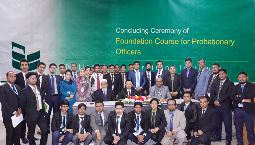 A S M Bulbul, AMD of National Bank Limited, poses for a photograph with the participants of the "Foundation Course on Probationary Officers" at the Bank's Training Institute in the city recently. Md. Humayun Kabir, Principal, Shah Syed Rafiul Bari, fac