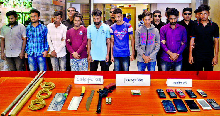 Members of RAB in a drive arrested nine suspected robbers from Diabari area in city on Sunday night along with fire arms and other equipment.