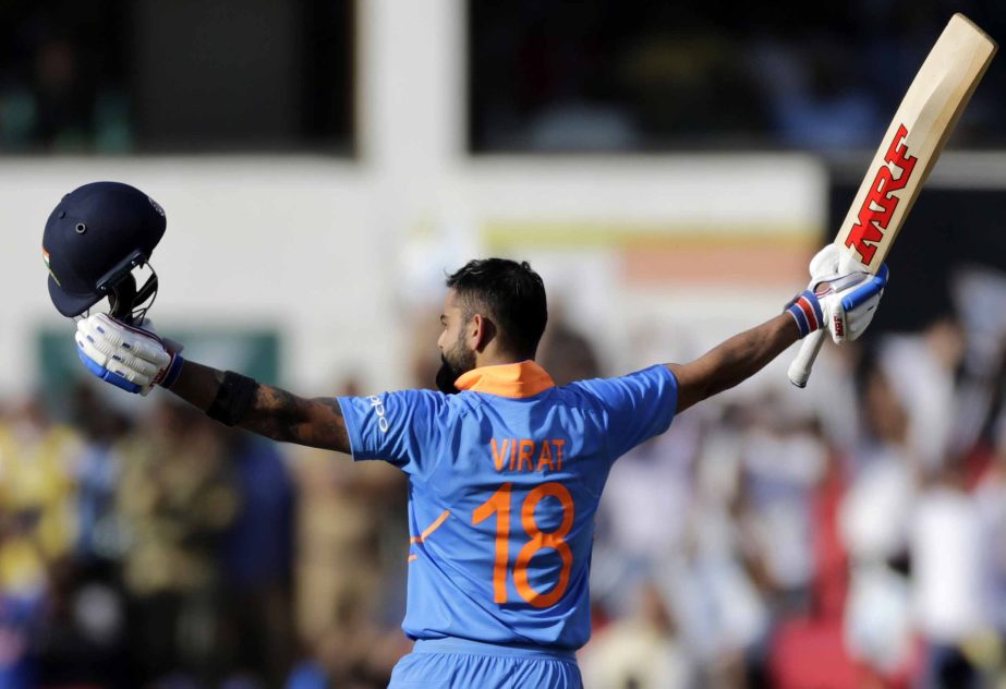 India's Virat Kohli celebrates his hundred during the second one-day international cricket match between India and Australia in Nagpur, India onTuesday.