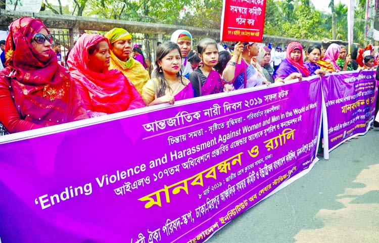 Different women organisations formed a human chain in front of the Jatiya Press Club on Friday marking International Women's Day.