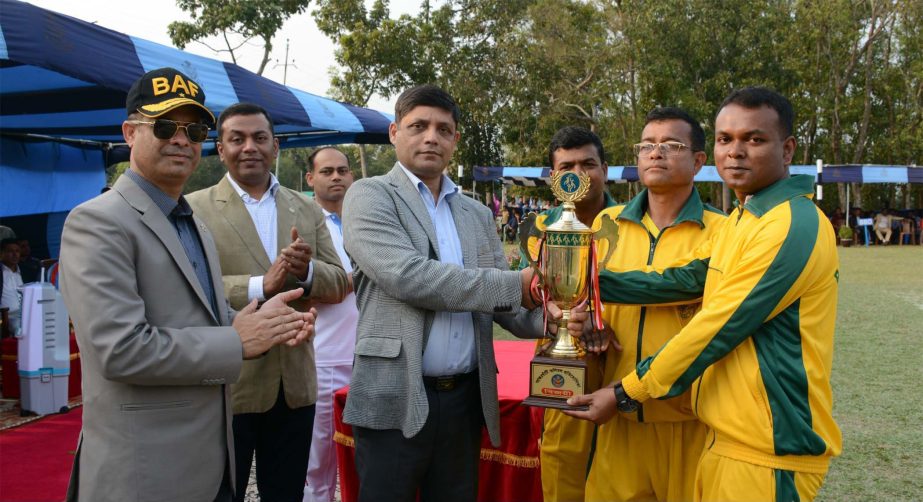 Assistant Chief of Air Staff (Maintenance) of Bangladesh Air Force (BAF) Air Vice Marshal Md Quamrul Ehsan giving away trophy to BAF Base Bir Shreshtho Motiur Rahman, which clinched the title of BAF Inter-Base Volleyball Competition at BAF Base Paharkanch