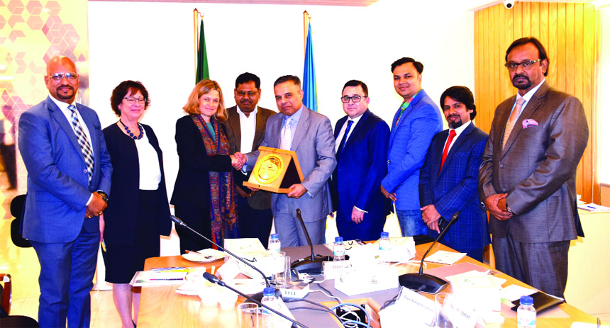 DCCI President Osama Taseer, presenting a crest to Ambassador of Sweden in Bangladesh Charlotta Schlyter at a function held in DCCI auditorium in the city recently. Ambassador of Denmark in Bangladesh Winnie Estrup Petersen, Waqar Ahmad Choudhury, Senior