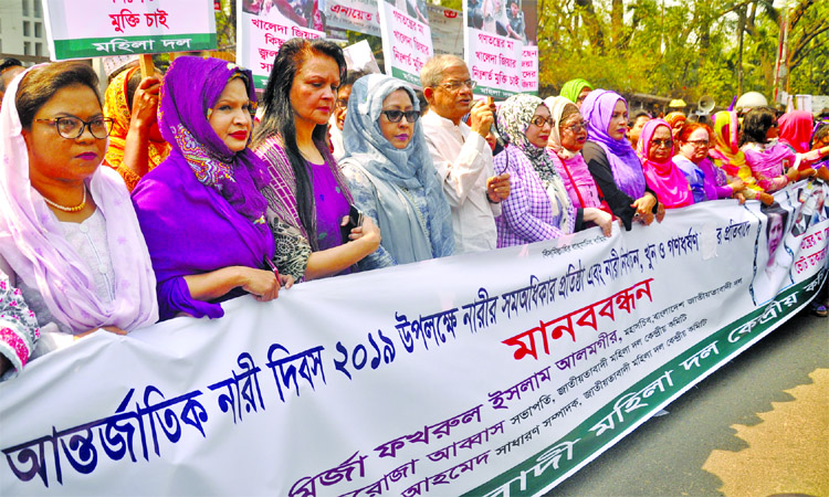 BNP Secretary General Mirza Fakhrul Islam Alamgir speaking at a human chain formed on the occasion of International Women's Day by Bangladesh Jatiyatabadi Mahila Dal in front of the Jatiya Press Club on Friday to meet its various demands including establ