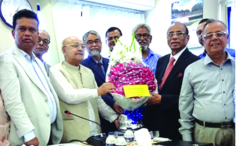 Directors of Union Insurance Company Limited, congratulating its newly elected Chairman Muzaffar Hossain Paltu with bucket at its head office in the city recently.
