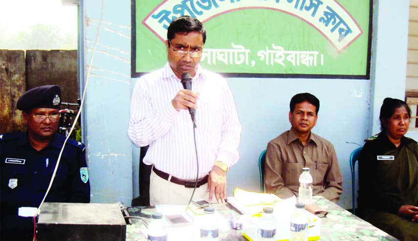 SAGHATA (Gaibandha ): Uzzal Kumar Gosh, UNO, Saghata Upazila speaking at a training courses of Ansar and VDP on Upazila Parishad election at Upazila Officers' Club as Chief Guest on Tuesday .