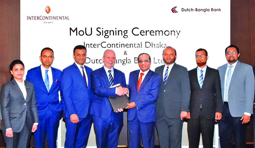 James P. McDonald, General Manager of InterContinental Dhaka and Abul Kashem Md. Shirin, CEO of Dutch-Bangla Bank Limited (DBBL), exchanging a MoU signing document 2019 to offer 'Buy 1 Get 1 Free' Breakfast, Lunch and Dinner for the bank VIP banking cus