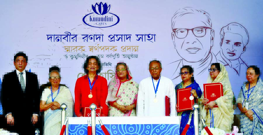 Prime Minister Sheikh Hasina poses for a photo session at a ceremony after distributing "Danveer Ranada Prasad Shaha Smarak Gold Medal"" to four eminent personalities including legendary political leader and former Prime Minister of erstwhile Pakistan"