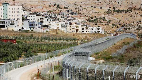 The village of Majdal Shams (left) in the Golan Heights, an area that US refers to as "Israeli-controlled" rather than "Israeli-occupied" in its latest annual human rights report.