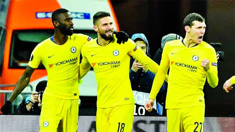 Chelsea's Antonio Ruediger, Olivier Giroud and Andreas Christensen celebrate a goal against Dynamo Kiev in the Europa League quarter-final football match between Chelsea and Dynamo Kiev on Thursday.