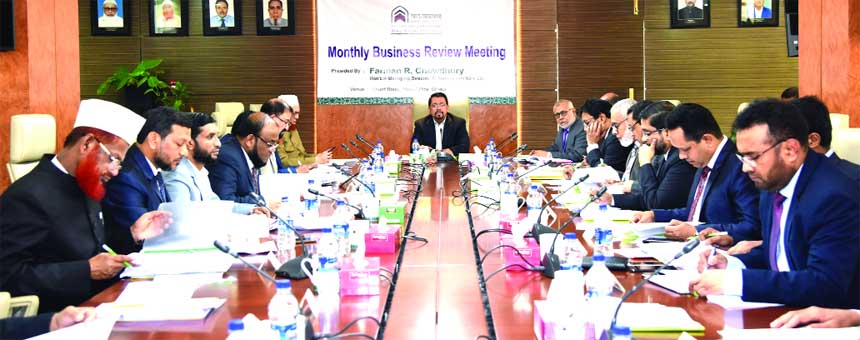 Farman R Chowdhury, Managing Director of Al-Arafah Islami Bank Limited, presiding over its 'Monthly Business Review Meeting' at its head office in the city recently. Md. Fazlul Karim, Muhammad Mahmoodul Haque and Mohammed Zubair Wafa, DMDs, head office