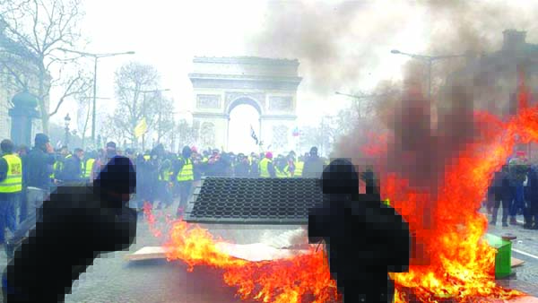 Police used tear gas and water cannons to repel protesters who gathered at the foot of the Arc de Triomphe.