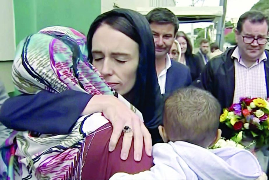 New Zealand prime minister Jacinda Ardern hugs a mourners at the Kilbirnie mosque in Wellington, New Zealand, on Sunday. Internet photo