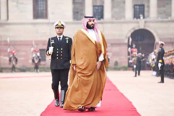 Saudi Crown Prince Mohammed bin Salman pictured in India, authorized the Rapid Intervention Group to suppress dissidents.