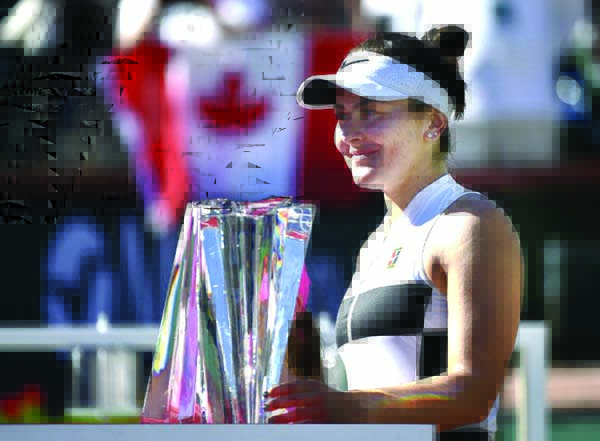 Canadian sensation Bianca Andreescu became the first wild card to win the WTA title at Indian Wells on Sunday with a gritty 6-4, 3-6, 6-4 victory over Wimbledon champion Angelique Kerber.