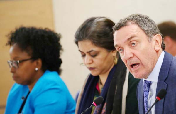 Santiago Canton (R) Chair of the Commission of Inquiry on the 2018 protests in the occupied Palestinian territory attends next to Sara Hossain (L) and Kaari Betty Murungi and at a session of the Human Rights Council at the United Nations in Geneva, Switze