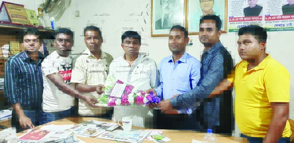 KULAURA (Moulvibazar): Joint Secretary of Upazila Awami League and Editor of Weekly Kulaurar Dak Principal A K M Shafi Ahmed Solman being greeted by the journalists and employees of Kulaurar Dak as he has been elected upazila chairman yesterday .