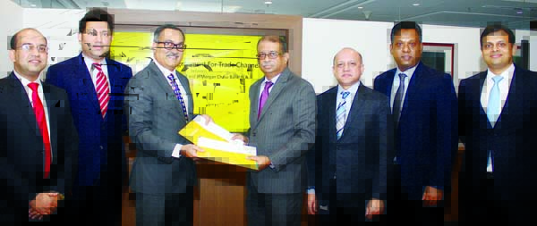 Ali Reza Iftekhar, Managing Director of Eastern Bank Limited (EBL) and Madhav Kalyan, Managing Director of J P Morgan Chase Bank NA, India and head of corporate banking (South and Southeast Asia), exchanging a partnership agreement signing documents for