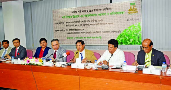 Speakers at a seminar on 'Diversification of Jute Goods for the Development of the Jute Industry: Opportunities and Challenges', organized by DCCI at its office on Monday.